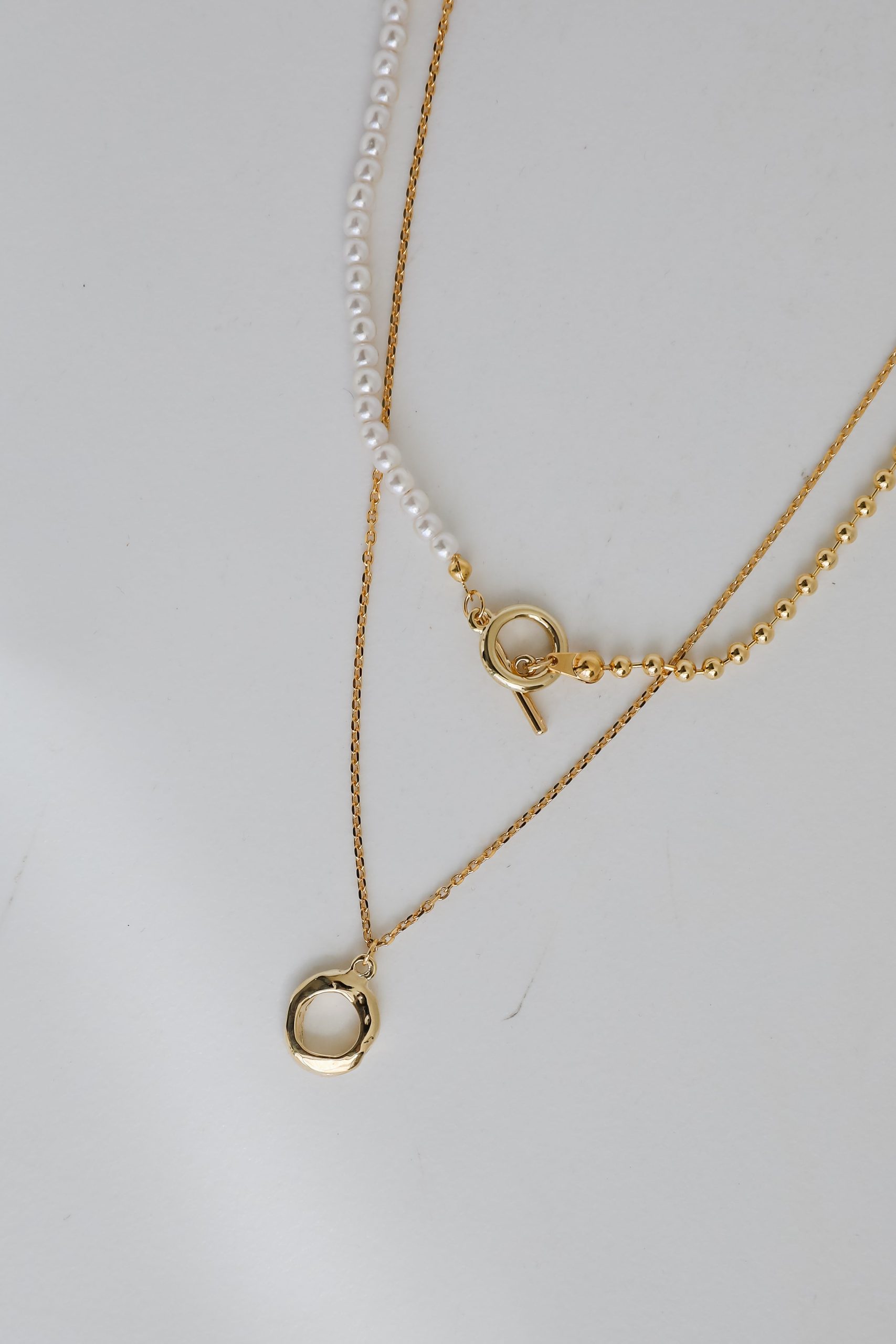 shopdressup_gold_layered_necklace-6_230880ce-cf04-4a49-a7bd-8a63409153e5.jpg